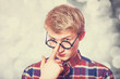 Young teen boy in nerd glasses.