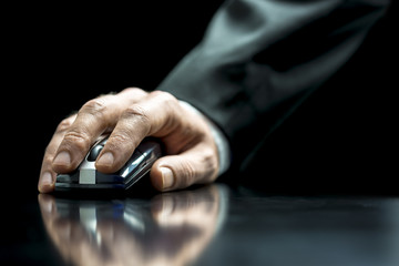 Wall Mural - man using a computer mouse