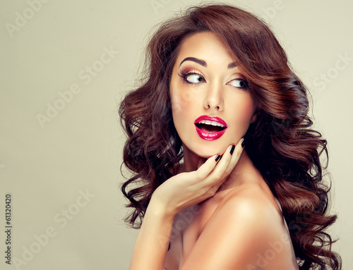 Fotografering Model with beautiful hairSurprised girl with wavy hair