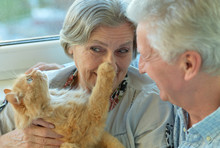 Older Couple With Cat