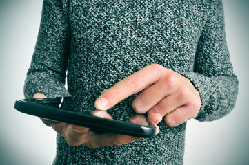 Wall Mural - man using a tablet computer