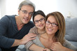 © goodluz - Portrait of family of 3 people wearing eyeglasses