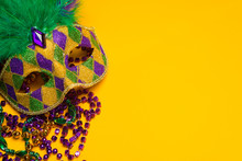 Colorful Mardi Gras Or Venetian Mask On Yellow