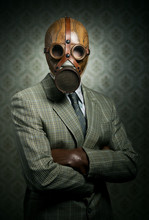 Vintage Businessman Wearing Gas Mask