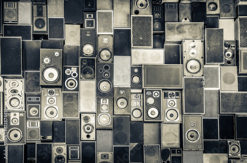 Fototapeta na wymiar Music speakers on the wall in monochrome vintage style