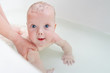 © golovianko - Cute Baby Boy Learns to Swim in the Bathtub