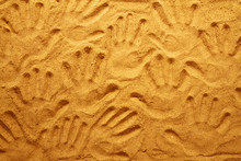 Hand Prints In The Sand