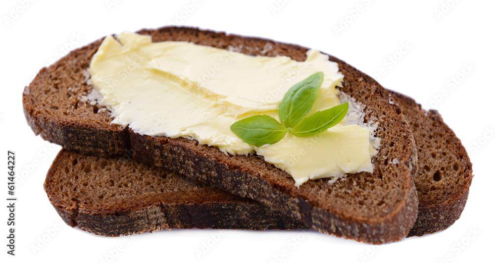 Slices of rye bread with butter, isolated on white