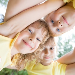low angle view portrait of happy children