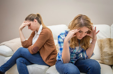 Furious mother arguing with her ​​teenage daughter