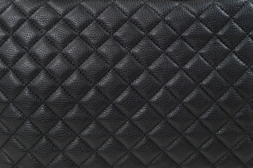 Fototapeta Close up of the black leather texture.