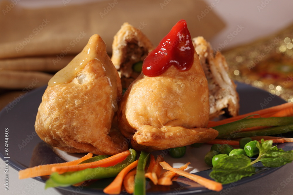 Samosa is an Indain fried or baked pastry with a savory filling Stock ...