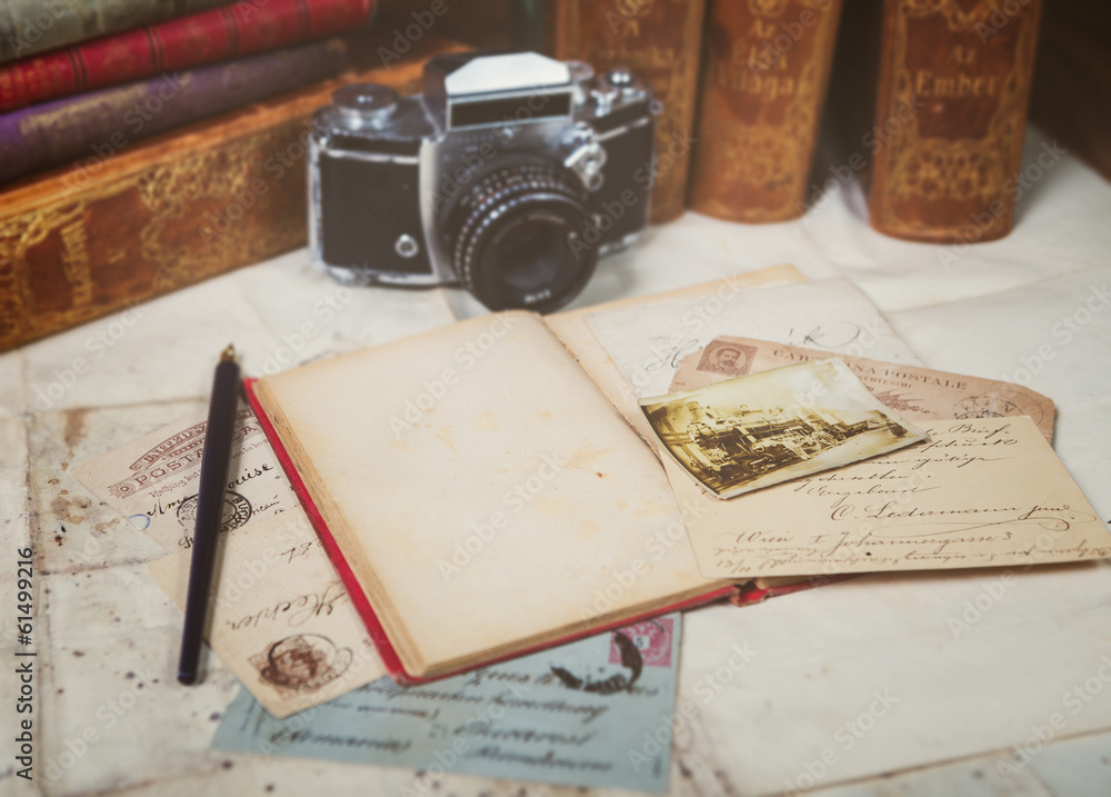 retro camera, old photos, letters and books with pen composition Stock ...