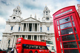 Fototapeta Londyn - St Paul's Cathedral, red bus, telephone booth. Symbols of London
