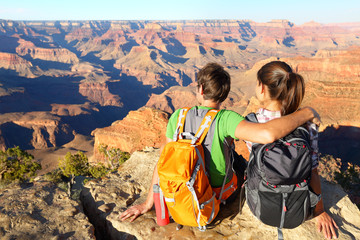 hiking hikers in grand canyon enjoying view