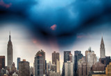 Fototapeta  - New York. Stunning skyline of Manhattan at sunset with major lan