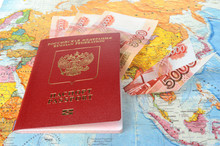 Russian International Passport With Money Within And Origami Pla