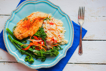 Wall Mural - Grilled chicken filled with spinach,served with rice and vegetab