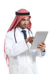 Wall Mural - Arab saudi emirates doctor man browsing a digital tablet