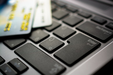 Concept of online shopping with keyboard and credit card