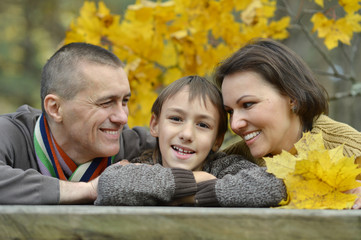 Canvas Print - Happy family of three on the nature