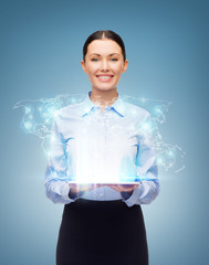 Canvas Print - businesswoman with tablet pc and world hologram