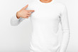 Close-up of a man pointing his fingers on a blank t-shirt