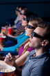 © gstockstudio - People watching three-dimensional movie.