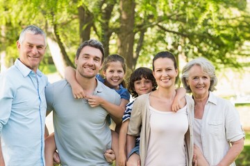 Portrait of a happy extended family in park