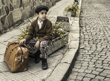 Child On A Road With Vintage Bag