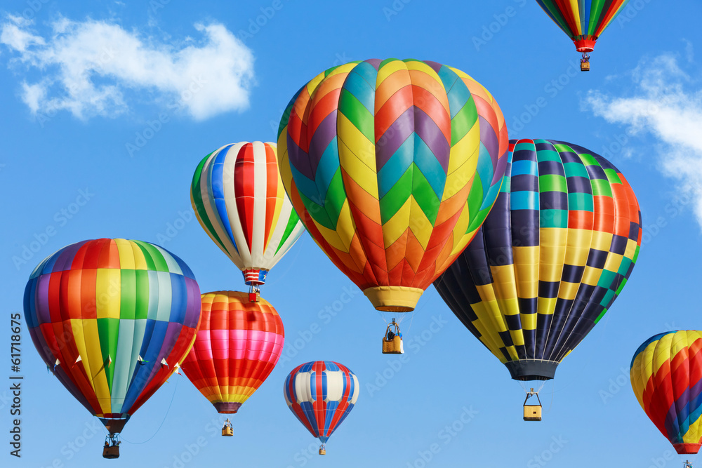 Colorful hot air balloons on blue sky with clouds - obrazy, fototapety, plakaty 
