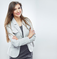 Wall Mural - smiling business woman portrait isolated on white background.