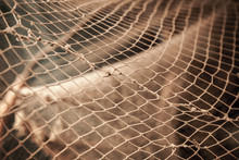 Old Fishing Net. Photo With Shallow Depth Of Field