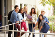 © Monkey Business - Portrait Of High School Students Standing Outside Building
