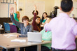 © Monkey Business - High School Students With Teacher In Class Using Laptops
