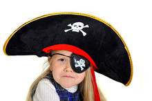 Cute Little  Blonde Girl In Pirate Hat And Eyepatch Playing