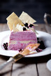 Blackcurrant ice cream terrine with white cocolate and berries o