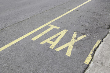 Wall Mural - Taxi sign painted on asphalt