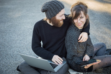 Wall Mural - young couple in love using tablet