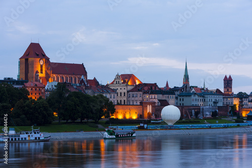 Plakat na papierze fotorealistycznym Stare miasto Torunia w nocy, kujawsko-pomorskie, polska