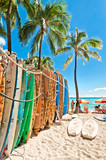 Fototapeta Uliczki - Surfboards in the rack at Waikiki Beach