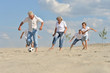 © aletia2011 - Family playing football