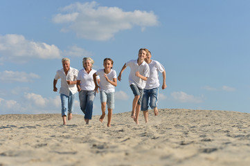 Poster - happy family  running