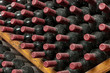 Stack of Aging Red Wine Bottles