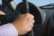 © TAGSTOCK2 - hand of businessman driving