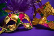 Assorted Mardi Gras Or Carnivale Mask On A Purple Background