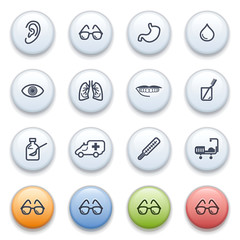 Canvas Print - Medicine icons on color buttons.