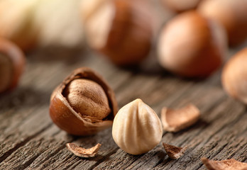 Hazelnuts, filbert on old wooden background