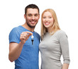 © Syda Productions - smiling couple holding keys