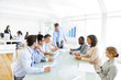 © Rawpixel.com - Group of Business People Meeting with Statistical Graph